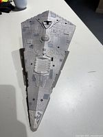 Top view showing detailed molded surface of gray plastic Star Destroyer ship.