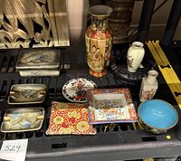 Full view of all vintage decorative items including ashtrays, various vases, enamel bowl, and trinket dishes.