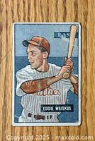 Front of 1951 Bowman baseball card showing Eddie Waitkus in Phillies uniform batting pose.