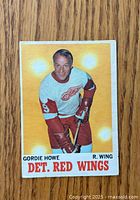 Front of card showing Gordie Howe in Red Wings uniform
