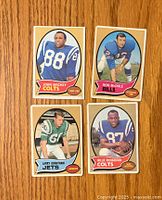Four 1970 Topps football cards shown front side with players' images and team identifiers.