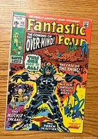 Front cover of Fantastic Four #113 comic showing main characters and Over-Mind as antagonist.