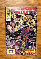 Front cover of Guardians of the Galaxy #1 comic, shows detailed cover art with multiple characters and bright red and yellow title text.