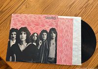Front of the Sparks vinyl record album cover showing the band members and red patterned background.