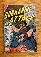 Front cover of Submarine Attack #12 comic showing naval warfare illustration with title and pricing details.
