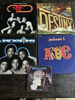 Overview of five vinyl records and sleeves by Jackson 5 and The Jacksons, including one 7-inch single.