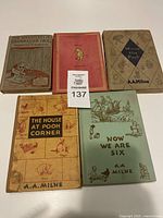 Photo showing all five vintage books by A.A. Milne and Thornton W. Burgess with varying cover designs and wear.