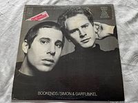 Front cover of 'Bookends' vinyl album showing black and white photo of Simon & Garfunkel with Columbia label sticker.