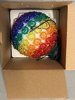 Two 7.5 inch diameter LED rainbow sphere lights featuring 100 LEDs each arranged in a rainbow color pattern inside a cardboard box.