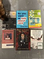 Photo showing all 6 books in the lot with covers visible including autobiographies and social topics.