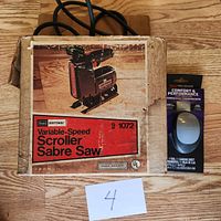 Closed original cardboard box for Craftsman variable-speed scroller sabre saw model 1072, showing product image and branding.