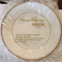 Close-up of the back stamp on the Mikasa bowl showing Bone China and brand details.