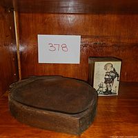 Photo showing rustic wood trinket dish and music box with child and dog illustration