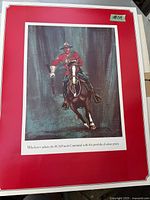 Mounted RCMP officer print on horse with red matted border