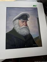 Full view of the signed painting showing the sailor old man portrait with a white beard and captain's hat
