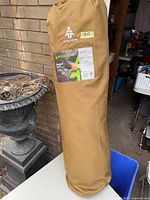 Woods Mammoth Camp Chair packed in brown carrying bag with the Woods logo and tag #152.