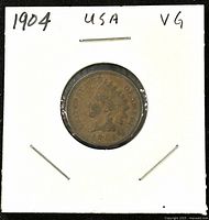 Obverse side of 1904 US Indian Head 1 Cent Bronze coin showing Native American head design and date 1904 with notation 'USA VG'.