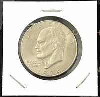 Obverse side of 1974D Eisenhower Dollar featuring portrait of Dwight D. Eisenhower.