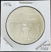 Front side of the 1976 Canadian silver coin showing Olympic boxing design with text and denomination.