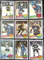 Front view of nine 1980-81 O-Pee-Chee NHL hockey trading cards arranged in three rows of three.