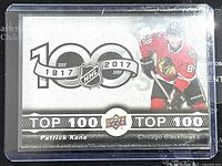 Front view of the 2017-2018 Tim Hortons Upper Deck Patrick Kane collectible hockey trading card showing the NHL 100 logo and player in Chicago Blackhawks uniform.