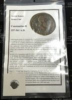 Photo of the coin mounted in a protective holder with detailed historical background information about Constantius II and the coin's origins.