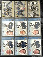 Front view of nine Upper Deck NHL hockey player trading cards. Top six cards show players in action, bottom three cards feature cartoon goalie characters with player portraits.