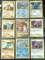 Front sides of nine assorted Pokémon trading cards in protective sleeve, showing Dugtrio, Primarina, Bronzor, Machoke, Tapu Koko V, Rattata, Machop, Totodile, and one more Rattata.