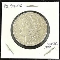 Obverse image of the 1888O Morgan silver dollar in a white cardboard coin holder, showing left-facing Lady Liberty profile with 'E PLURIBUS UNUM' and silver .9000 purity mark.