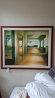 Full view of framed wall art painting showing empty room and mirror effect