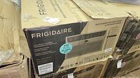 Frigidaire air conditioner box front showing brand and 10,000 BTU label