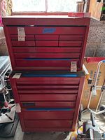 Stacked view of top chest on bottom cabinet showing overall condition