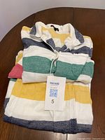 Folded Hudson's Bay flannel pajamas showing large horizontal color stripes