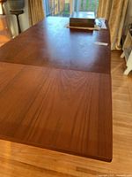 Table top showing grain and leaf seam