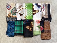 Overview of ten scarves arranged in two rows showing patterns and colors