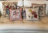 All five pillows arranged on sofa