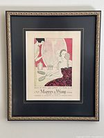 Full view of the framed vintage Art Deco advertisement print for Mappin & Webb vanity mirror, brush, and comb set.