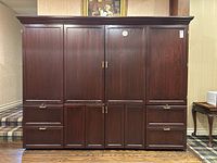 Full front view of entire office wall unit with doors closed