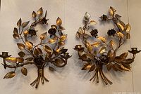 Pair of gold gilt Italian Florentine wall sconces side by side front view