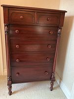 Front view of entire dresser showing finish and drawer arrangement