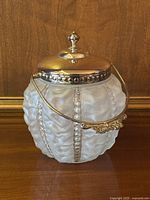 Front view of biscuit barrel with lid closed