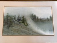 Close-up of misty forest landscape and lower right signature
