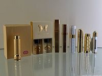 Full view of all perfume atomizers and boxed sample perfume set