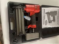 King Canada 18 gauge brad nailer in molded plastic case with strip of nails and instruction manual.
