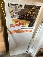 Front of boxed Powerblade ATV Snow Blade showing branding and ATV usage image