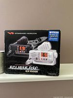 Box showing the Standard Horizon Eclipse DSC GX1000S marine transceiver images and branding.