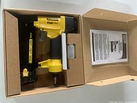 Stanley FatMax 18 Gauge brad nailer in box with manual and oil container