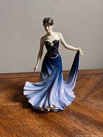 Front view of the Royal Doulton Pretty Ladies figurine named Catherine, showing detailed gown and pose.