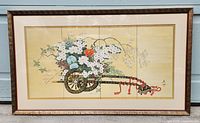 Full view of the large framed Japanese artwork showing the floral cart and flowers.