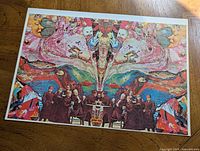 Full view of vintage psychedelic pop art poster featuring a mirrored image with colorful abstract patterns, children figures, moon, and cat elements.